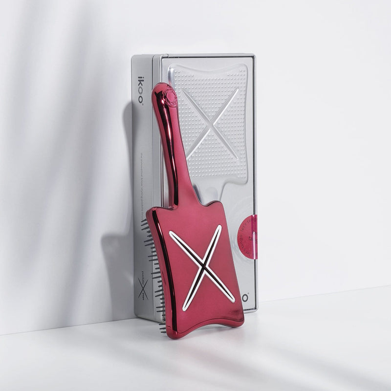 Ideal zum Mitnehmen: die Paddle X Pops Stylingbürste in rot