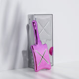 Ideal zum Mitnehmen: die Paddle X Pops Small Stylingbürste in violett